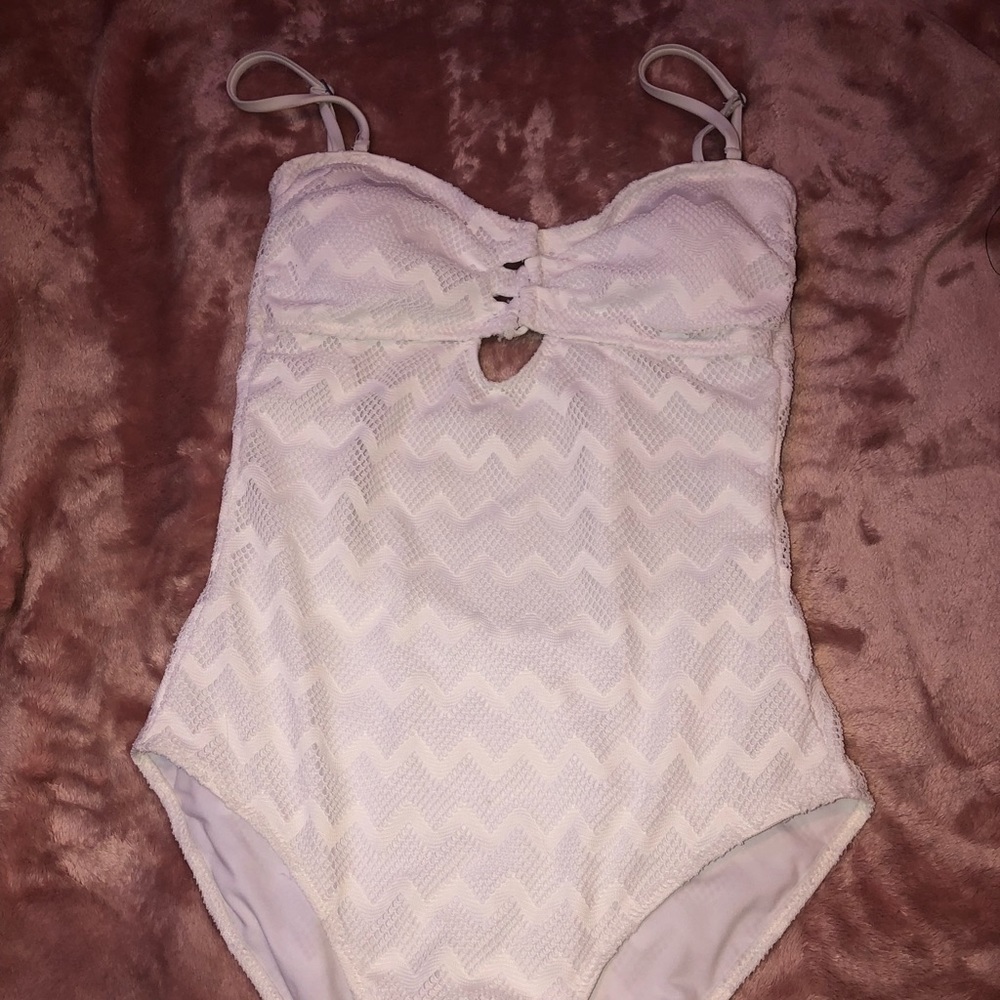 A white one piece swim suit